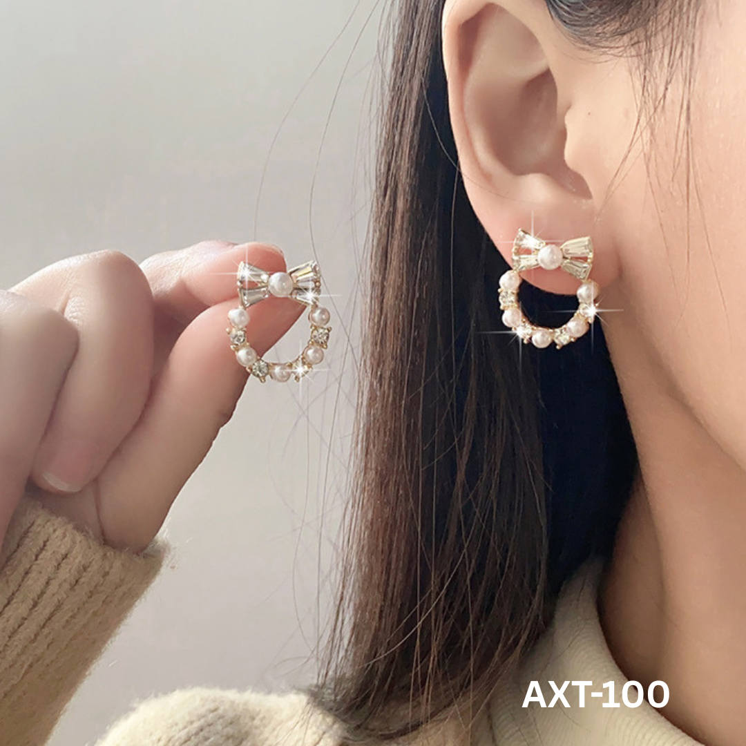 AXT-100 Golden Pearl Bow Korean Zircon Earrings By BSM - BSM WHOLESALE