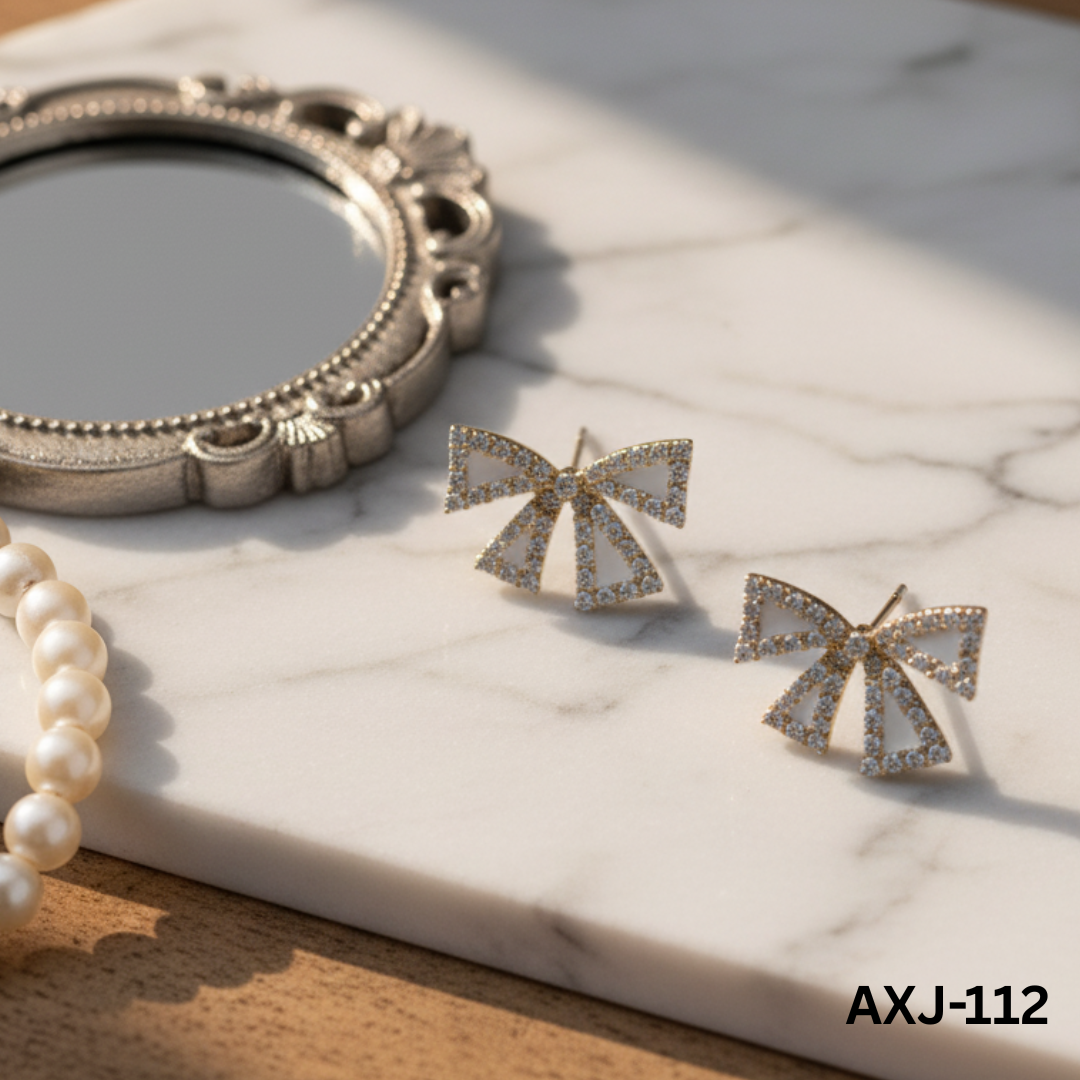 AXJ-112 White Zircon Bow Shape Earrings By BSM - BSM WHOLESALE
