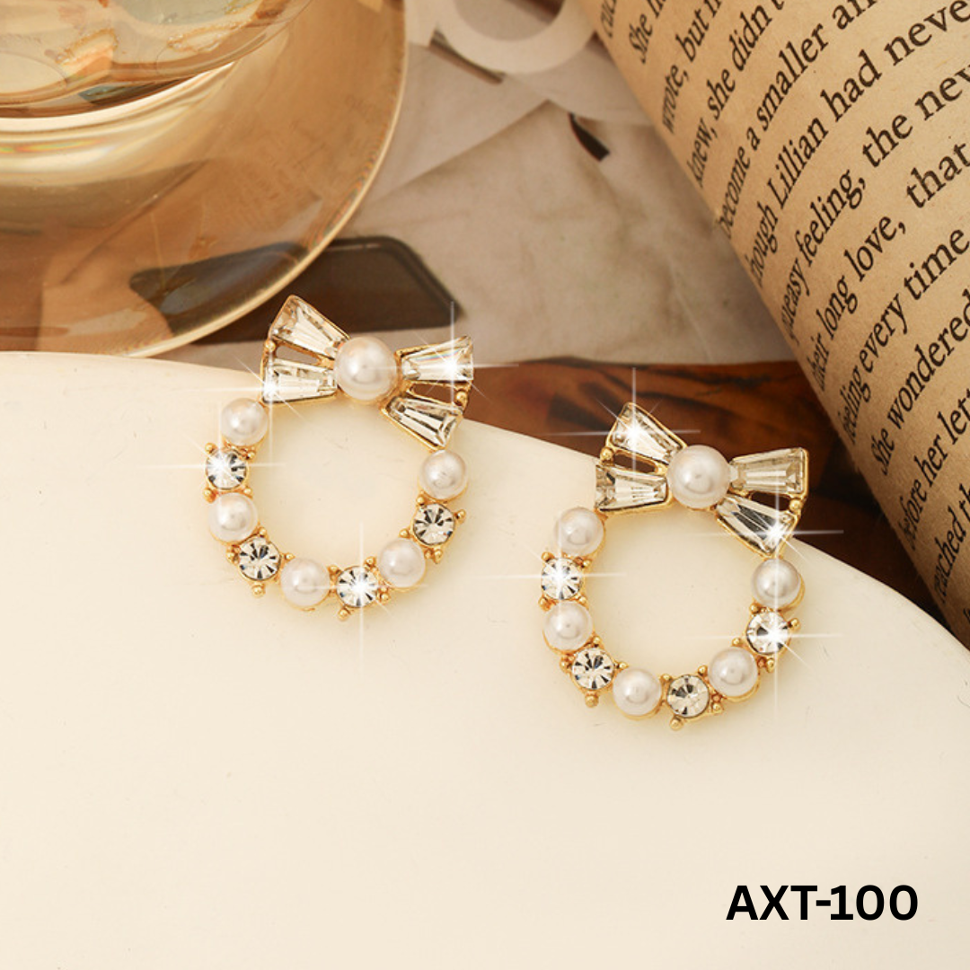 AXT-100 Golden Pearl Bow Korean Zircon Earrings By BSM - BSM WHOLESALE