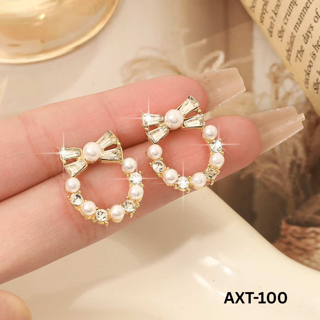 AXT-100 Golden Pearl Bow Korean Zircon Earrings By BSM - BSM WHOLESALE