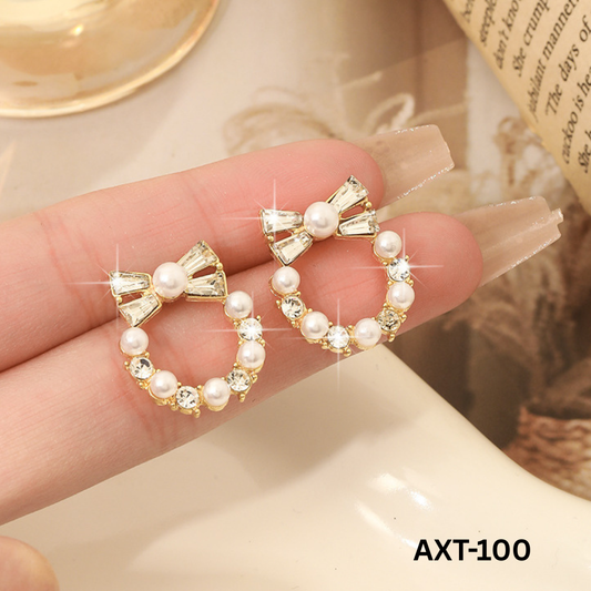 AXT-100 Golden Pearl Bow Korean Zircon Earrings By BSM - BSM WHOLESALE