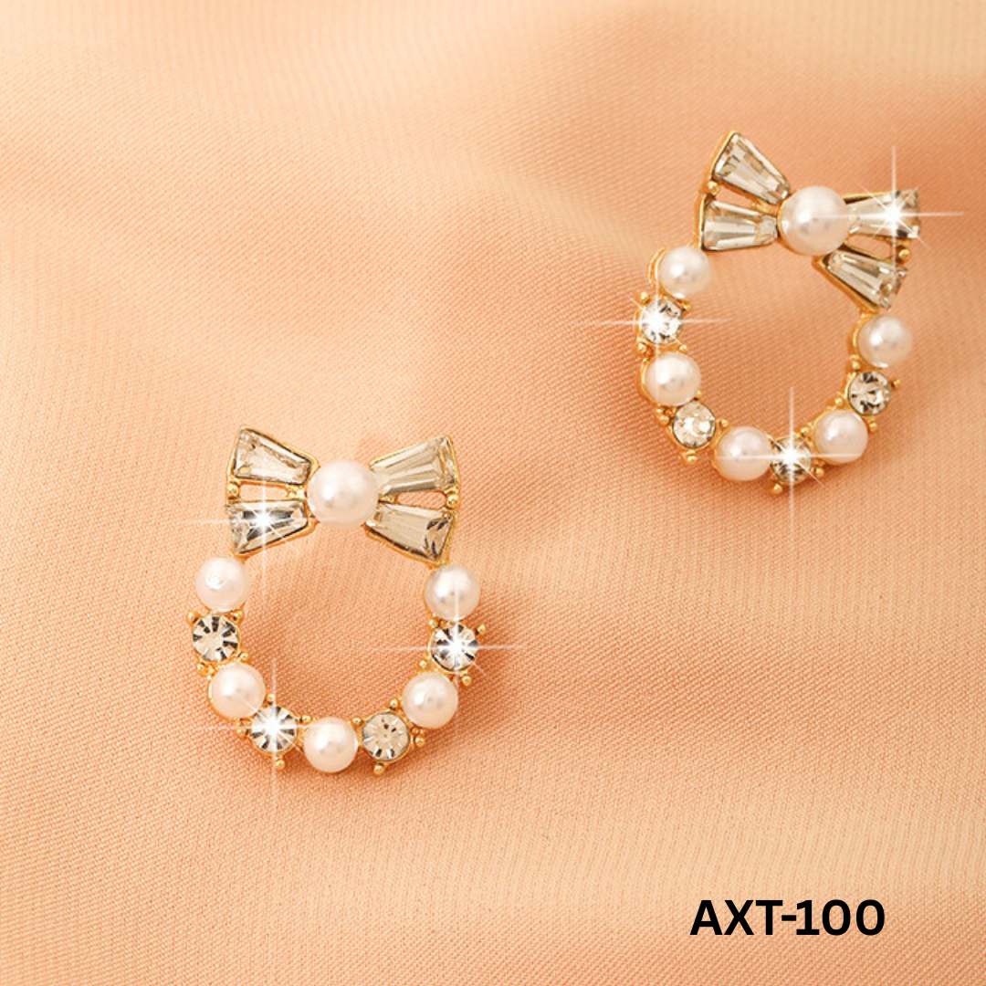AXT-100 Golden Pearl Bow Korean Zircon Earrings By BSM - BSM WHOLESALE