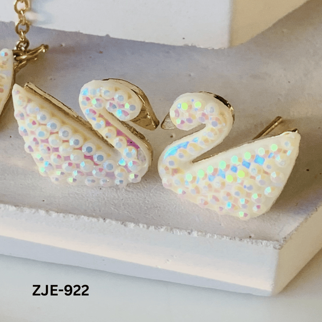ZJE-922 White Sparkling Swan Earrings By BSM - BSM WHOLESALE